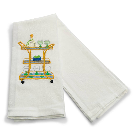 White towel with a bar cart illustration on a white background
